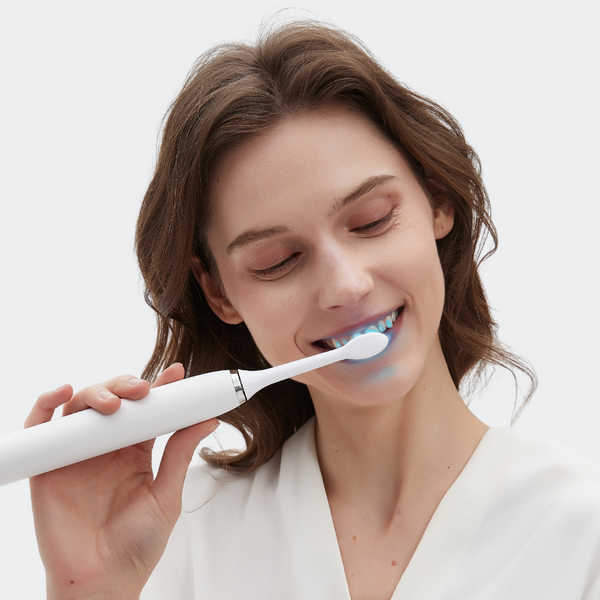 Brosse à dents électrique 2-en-1 LED - 4 modes de nettoyage et poils souples